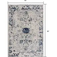 Photo of Navy Blue Distressed Floral Area Rug