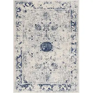 Photo of Navy Blue Distressed Floral Area Rug