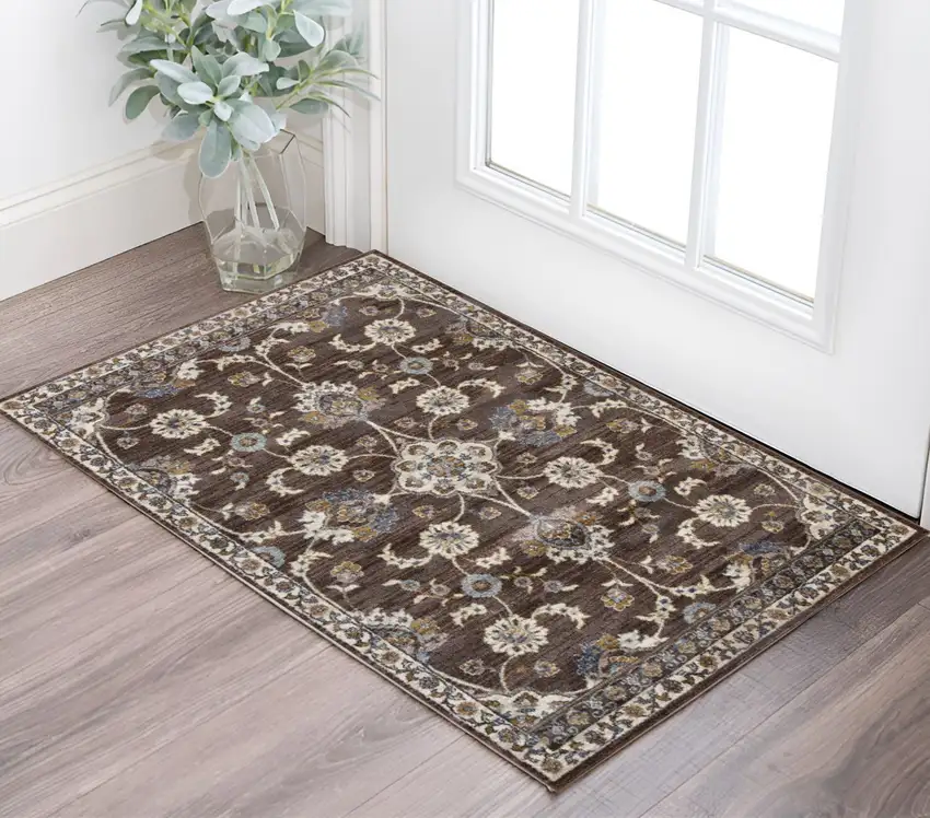 Ivory Navy and Orange Floral Power Loom Area Rug Photo 1