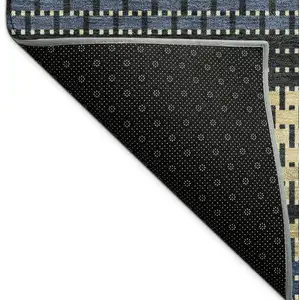 Photo of Navy Blue Gold And Black Striped Washable Indoor Outdoor Area Rug