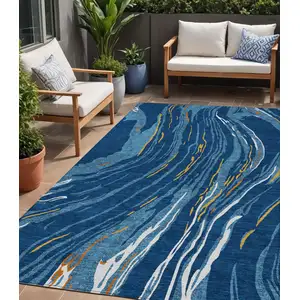 Photo of Navy Blue Gold And Copper Abstract Washable Indoor Outdoor Area Rug