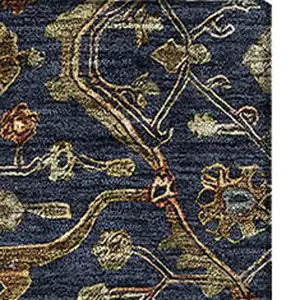 Photo of Navy Blue Gold And Copper Oriental Washable Area Rug With UV Protection