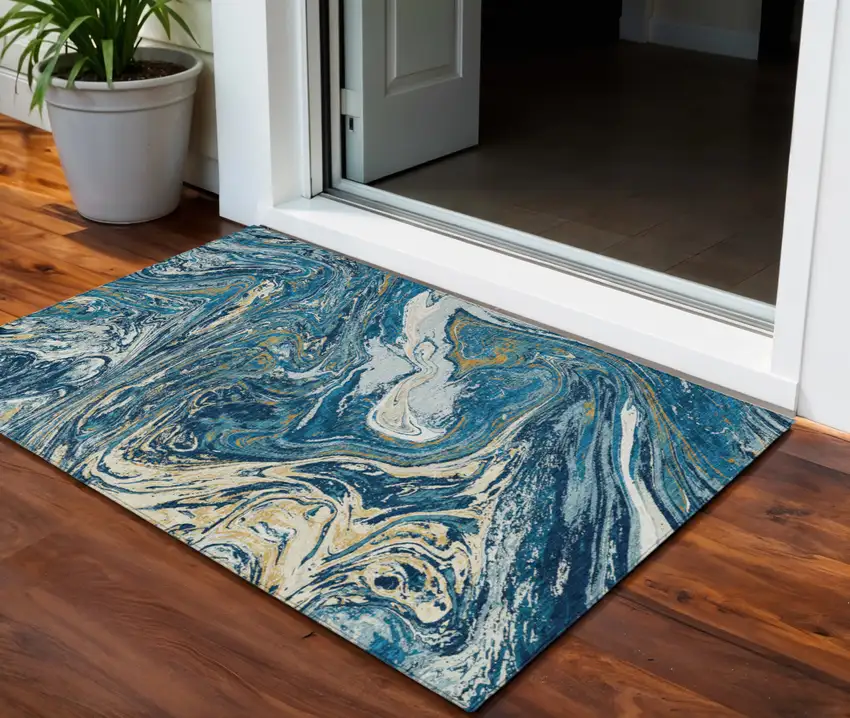 Navy Blue Gold And Ivory Abstract Washable Indoor Outdoor Area Rug Photo 1