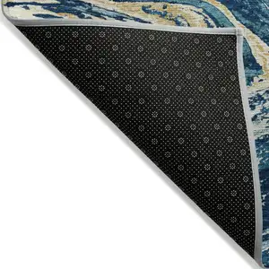 Photo of Navy Blue Gold And Ivory Abstract Washable Indoor Outdoor Area Rug
