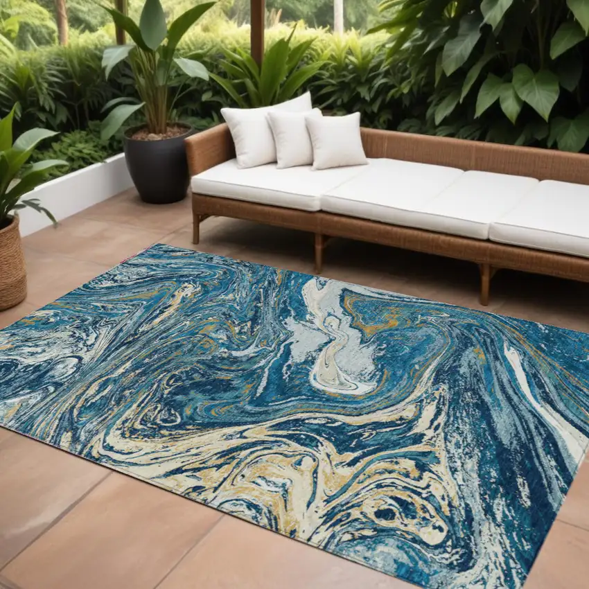 Navy Blue Gold And Ivory Abstract Washable Indoor Outdoor Area Rug Photo 1