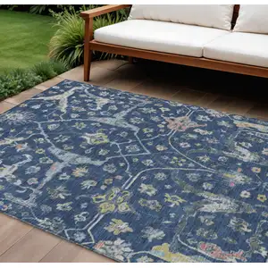 Photo of Navy Blue Gold And Ivory Floral Washable Indoor Outdoor Area Rug