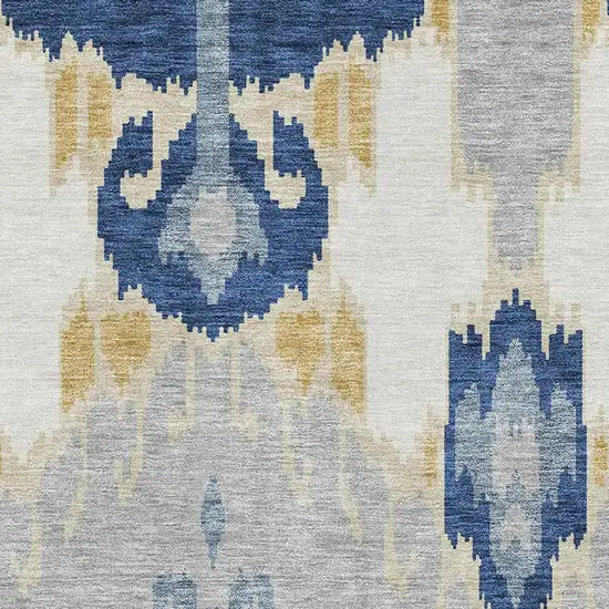 Navy Blue Gold And Ivory Ikat Washable Area Rug With UV Protection Photo 3