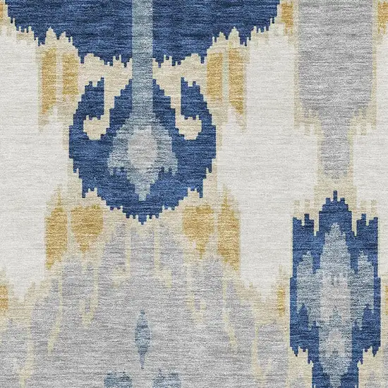 Navy Blue Gold And Ivory Ikat Washable Area Rug With UV Protection Photo 3