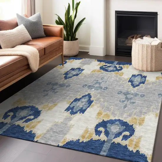 Navy Blue Gold And Ivory Ikat Washable Area Rug With UV Protection Photo 6