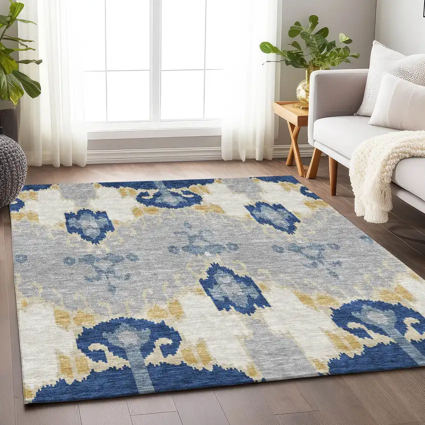 Navy Blue Gold And Ivory Ikat Washable Area Rug With UV Protection Photo 5