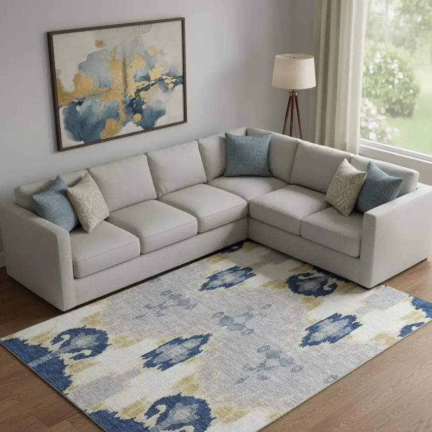 Navy Blue Gold And Ivory Ikat Washable Area Rug With UV Protection Photo 1