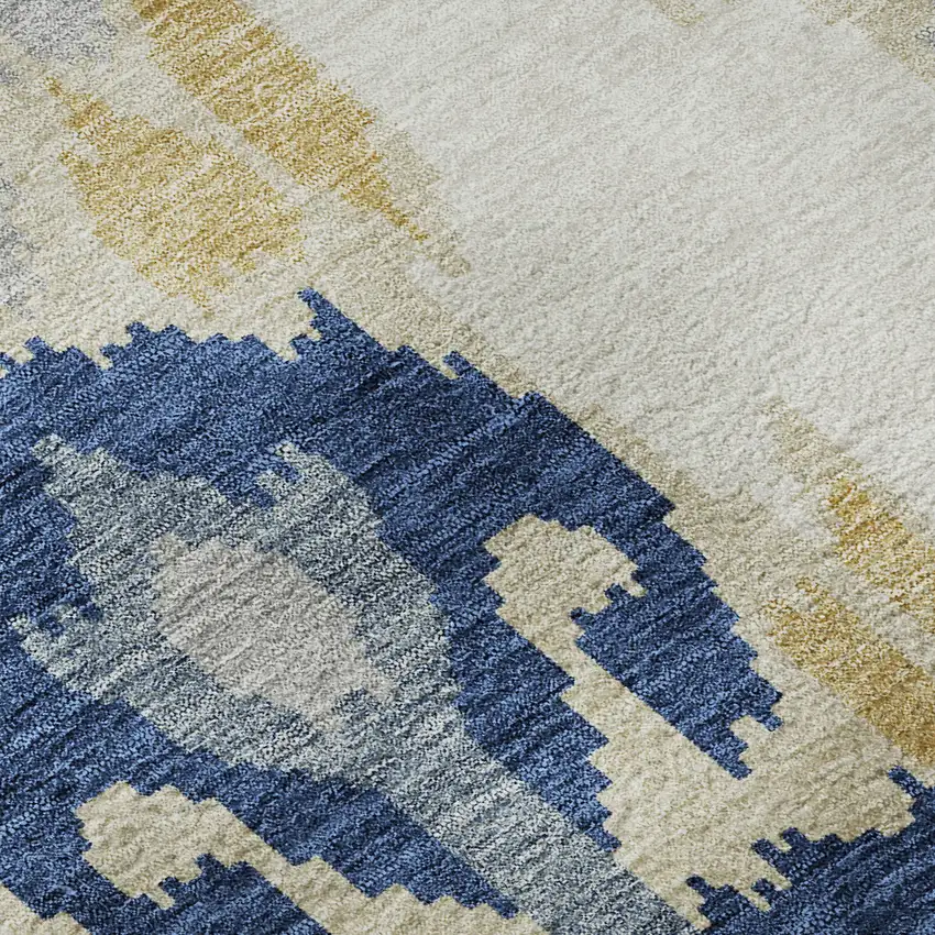 Navy Blue Gold And Ivory Ikat Washable Area Rug With UV Protection Photo 9