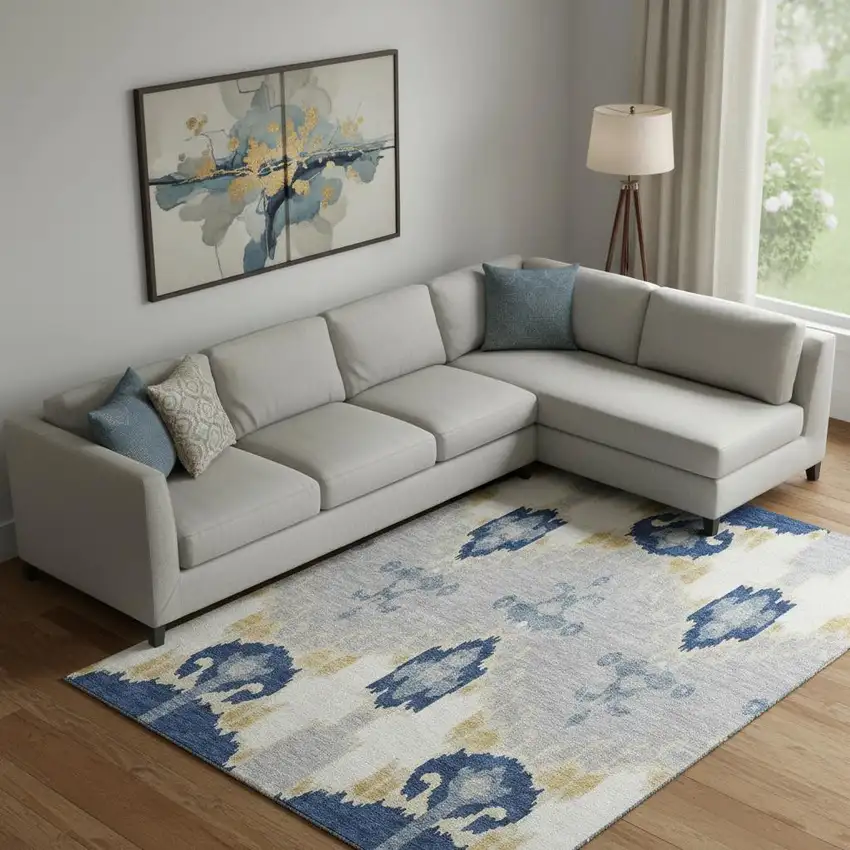 Navy Blue Gold And Ivory Ikat Washable Area Rug With UV Protection Photo 1