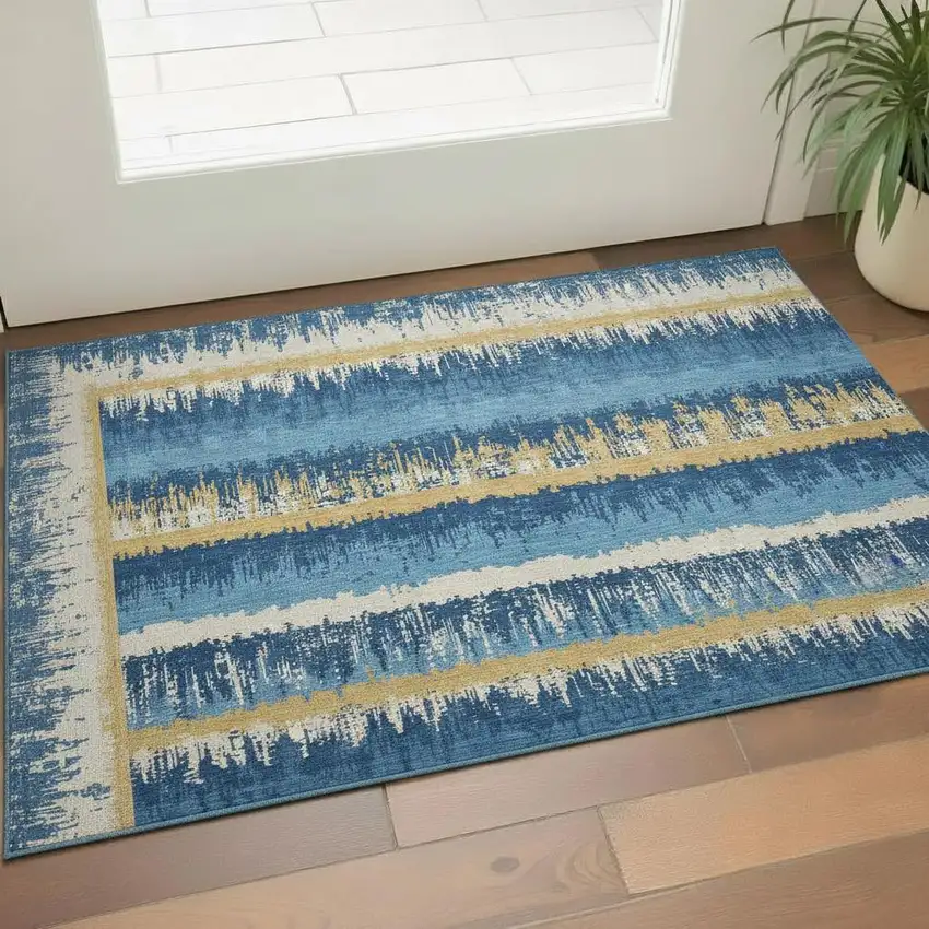 Navy Blue Gold And Ivory Striped Washable Area Rug With UV Protection Photo 2