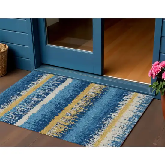 Navy Blue Gold And Ivory Striped Washable Indoor Outdoor Area Rug Photo 1