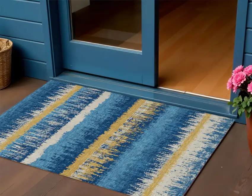 Navy Blue Gold And Ivory Striped Washable Indoor Outdoor Area Rug Photo 1
