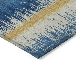 Photo of Navy Blue Gold And Ivory Striped Washable Indoor Outdoor Area Rug