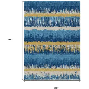 Photo of Navy Blue Gold And Ivory Striped Washable Indoor Outdoor Area Rug
