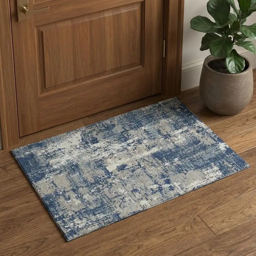 Navy Blue Gray And Ivory Abstract Washable Area Rug With UV Protection Photo 1