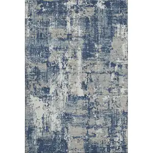 Photo of Navy Blue Gray And Ivory Abstract Washable Area Rug With UV Protection