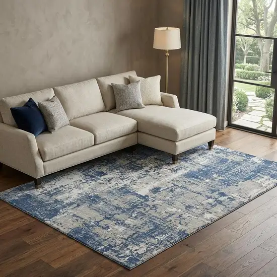 Navy Blue Gray And Ivory Abstract Washable Area Rug With UV Protection Photo 1