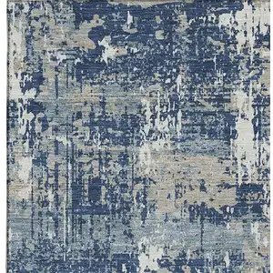 Photo of Navy Blue Gray And Ivory Abstract Washable Area Rug With UV Protection