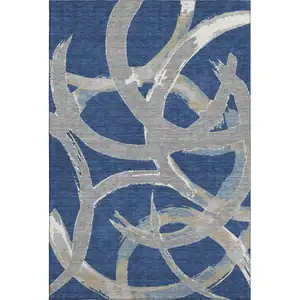 Photo of Navy Blue Gray And Ivory Abstract Washable Area Rug With UV Protection