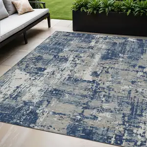 Photo of Navy Blue Gray And Ivory Abstract Washable Indoor Outdoor Area Rug