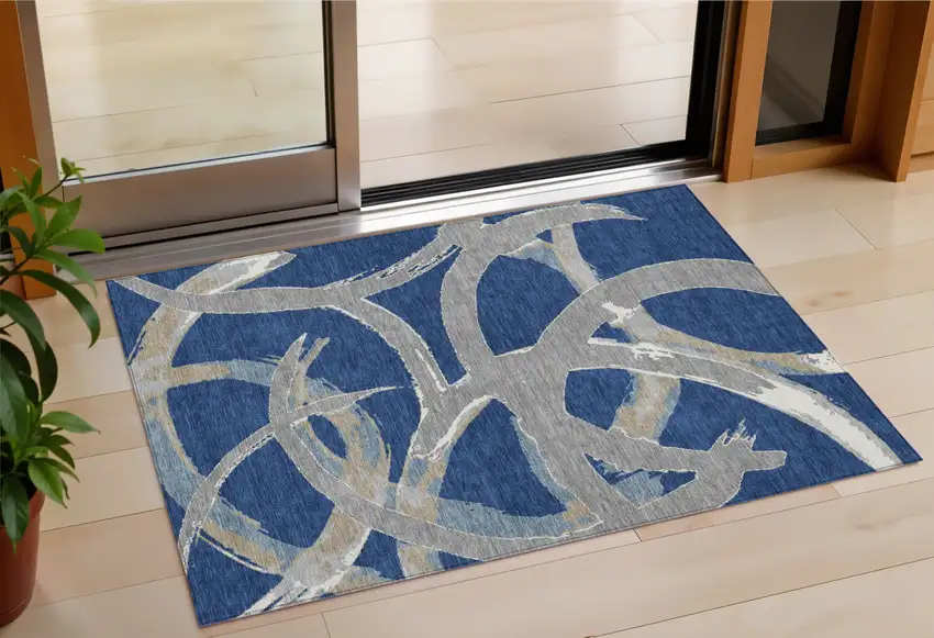 Navy Blue Gray And Ivory Abstract Washable Indoor Outdoor Area Rug Photo 1