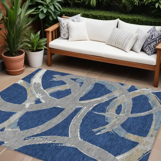 Navy Blue Gray And Ivory Abstract Washable Indoor Outdoor Area Rug Photo 1