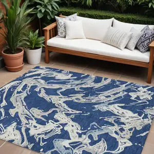 Photo of Navy Blue Gray And Ivory Abstract Washable Indoor Outdoor Area Rug