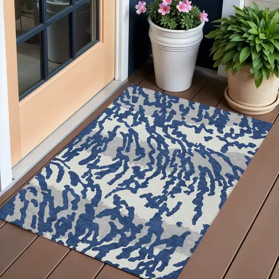 Navy Blue Gray And Ivory Animal Print Washable Indoor Outdoor Area Rug Photo 1