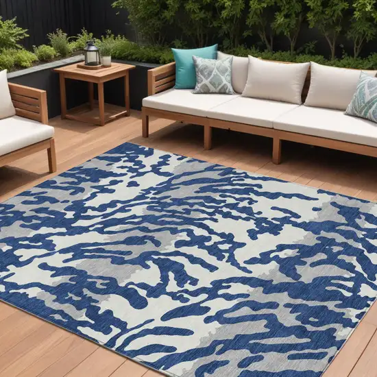 Navy Blue Gray And Ivory Animal Print Washable Indoor Outdoor Area Rug Photo 1