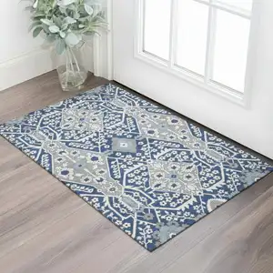 Photo of Navy Blue Gray And Ivory Floral Washable Area Rug With UV Protection