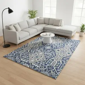Photo of Navy Blue Gray And Ivory Floral Washable Area Rug With UV Protection