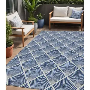 Photo of Navy Blue Gray And Ivory Geometric Washable Indoor Outdoor Area Rug