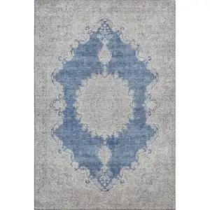 Photo of Navy Blue Gray And Ivory Oriental Washable Area Rug With UV Protection