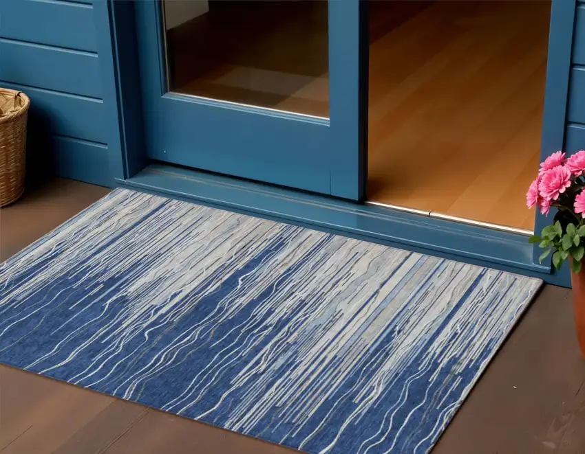 Navy Blue Gray And Ivory Striped Washable Indoor Outdoor Area Rug Photo 1
