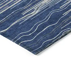Photo of Navy Blue Gray And Ivory Striped Washable Indoor Outdoor Area Rug