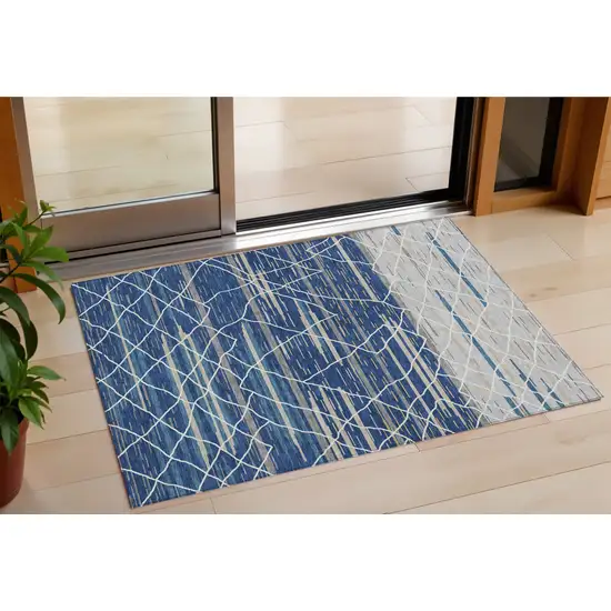 Navy Blue Gray And Ivory Striped Washable Indoor Outdoor Area Rug Photo 1