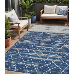 Photo of Navy Blue Gray And Ivory Striped Washable Indoor Outdoor Area Rug
