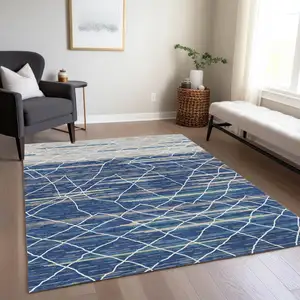 Photo of Navy Blue Gray And Ivory Striped Washable Indoor Outdoor Area Rug