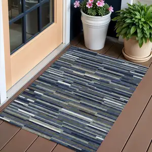 Photo of Navy Blue Gray And Ivory Striped Washable Indoor Outdoor Area Rug