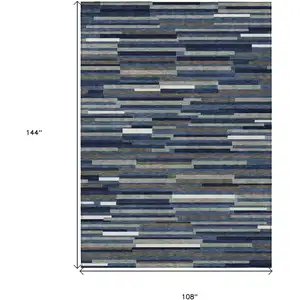 Photo of Navy Blue Gray And Ivory Striped Washable Indoor Outdoor Area Rug