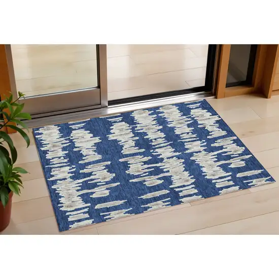 Navy Blue Gray And Ivory Striped Washable Indoor Outdoor Area Rug Photo 1