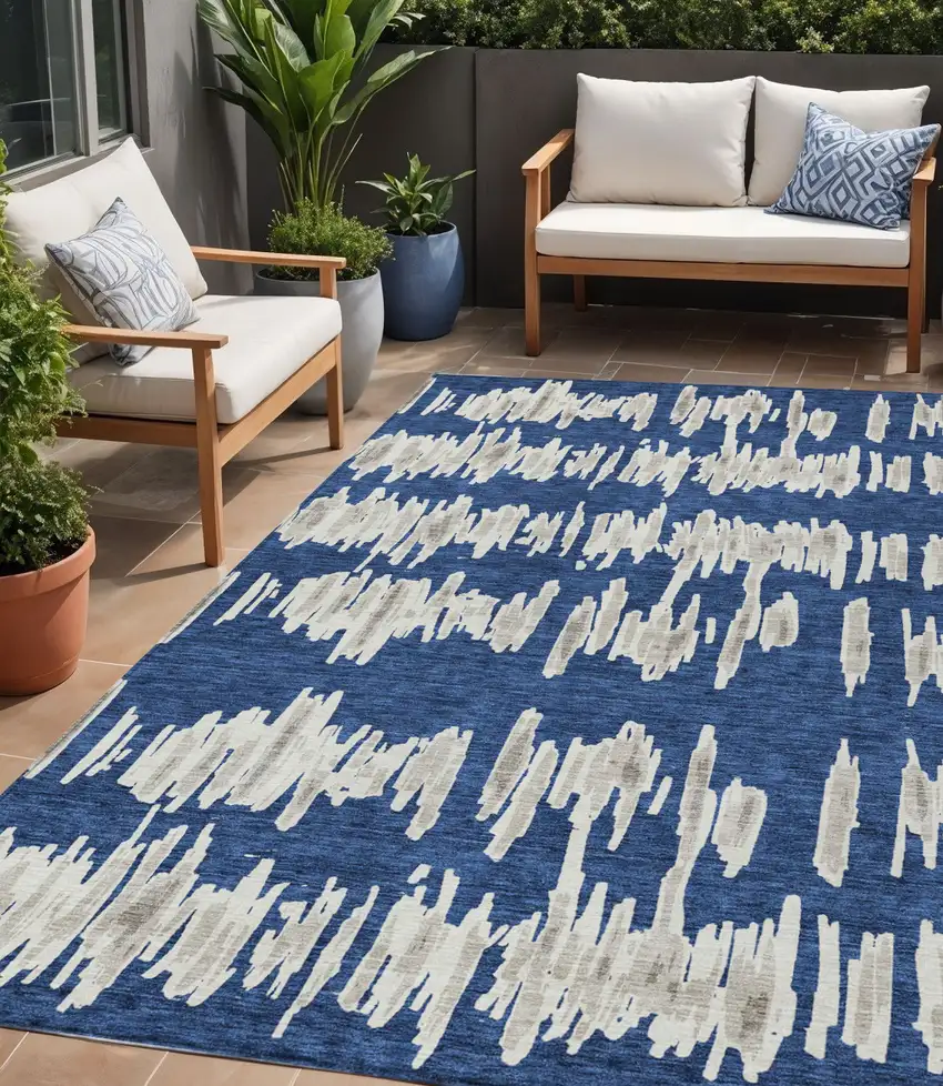 Navy Blue Gray And Ivory Striped Washable Indoor Outdoor Area Rug Photo 1