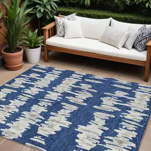 Photo of Navy Blue Gray And Ivory Striped Washable Indoor Outdoor Area Rug