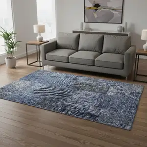 Photo of Navy Blue Gray And Silver Patchwork Washable Area Rug With UV Protection