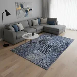 Photo of Navy Blue Gray And Silver Patchwork Washable Area Rug With UV Protection