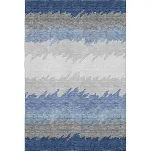 Photo of Navy Blue Gray And Silver Striped Washable Area Rug With UV Protection